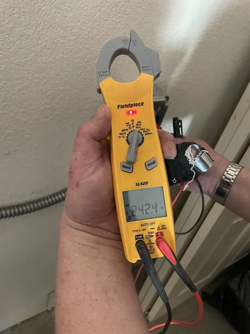 Voltage testing with clamp meter during Generator Installation in Centerville